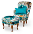 Mia armchair and footstool in fabric Paradise turquoise, legs in cheery, lased0. Made in Sweden. Cusion 33x50 fabric Two Tone.