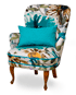 Mia armchair fabric Paradise turquoise, legs in cheery, lased. Made in Sweden. Cusion 33x50 fabric Two Tone.
